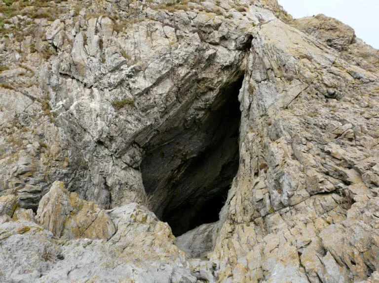 a cave in the side of a cliff